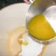 Add The Sugar, Almonds and Melted Butter into The Beaten Egg Mixture and Mix Well.