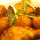 Chicken adobo seasoned with garlic, ginger, bay leaf, soya sauce and vinegar.