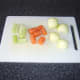 Vegetables are roughly chopped before going in to stock pot