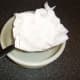 A lining of kitchen paper in the sieve will strain the finest impurities and much of the fat from the stock