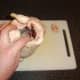 The parson's nose is cut off the chicken and the cavity is seasoned