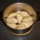 Sealed chicken pieces are added to stew pot