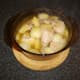 Chicken and pineapple casserole is removed from the oven