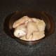 Sealed chicken pieces are added to casserole dish