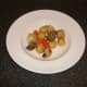 Vegetables are plated first when serving casserole