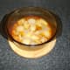 Spicy pork casserole is rested for fifteen minutes while rice is prepared