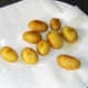 Drain the roast potatoes on paper.