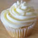 Take the cupcake of your choice and pipe it with buttercream, using a star-tipped nozzle to create a nice swirl.