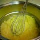 Egg yolks in double boiler with salt, milk and sugar