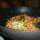 Add jalepeno peppers, green onions and garlic
