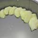 If desired, layer slices into the pan in a decorative manner.