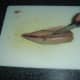 Removing the bones from a mackerel fillet