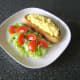 Scrambled egg is added to toast