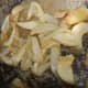Roasting ginger, garlic and salt in oil