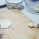 Roll out each ball of dough