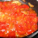 Added tomatoes to the pan and cooked it until it is soft.