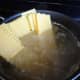The noodles will absorb the water and move down into the pot.