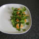Watercress and satsuma segmnets are plated