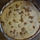 The finished pie is a light golden brown on top with tempting little bits of Pop-Tarts!