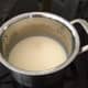 5. In a separate pot, make a white sauce with butter, flour and milk.