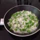 4. Saute finely chopped green pepper and onion in butter.