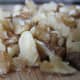 Half of the walnuts - chopped.