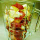 Strawberries and apple in the blender