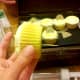 Add toothpicks to the bottom of the cupcakes to be able to secure in the top of the shoe box.