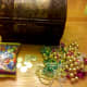 The supplies to make treasure chest cupcakes.
