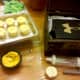 Cut out holes in the top of a shoe box to use as a cupcake holder.