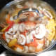After the veggies have steamed for about five minutes add 1 cup of shredded colby-jack cheese over the top of the veggies. Cover and bring the heat down to low.