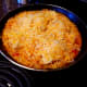 Remove from heat and cover with shredded cheese. Replace lid and allow cheese to melt for 5 minutes.
