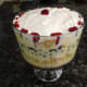 10. Add strawberry slices around the rim and place one slice in center of trifle.