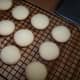 Cooling the cookies on a rack keeps them crisp.