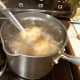 Step 2 (do at the same time as step 1): Cover potatoes with water in pan. Put on stove. Heat to boiling. Boil 20-30 minutes or until knife goes into potato easily and skin peels back.