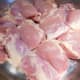 Place boneless chicken thighs in a skillet over medium heat (grease the skillet with 1 tablespoon of canola oil). Cover and cook for about 15 minutes.