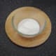 Yoghurt is poured in to a bowl for making pakora sauce