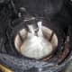 Letting water collect when the carafe is removed during the production process.