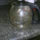Add two cups of white vinegar to the carafe,