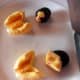 The seed of the top ackee was plucked, whereas the seed of the bottom ackee was cut out with a knife.