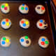 Flatten dough and add extra M&M's to top of each cookie.