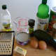 You will need to set aside the ingredients, a grater, a cutting board, a measuring cup, a pan and a bowl.