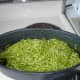 Mix the pesto into drained pasta, in the same pan.