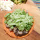 A topping of shredded lettuce keeps this delicious meal cool and crisp.