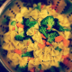 Draining the pasta and healthy veggies in the colander.