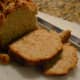Moist, dense bread with a fluffy, crunchy top.