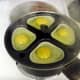 Eggs being poached. Cover for a few minutes and check occasionally to see when done.