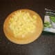 Chopped potatoes and frozen peas for soup