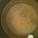 Apple juice in the pan, pectin added and the stirring has begin to dissolve it.