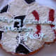 Soccerball and baseball-themed donut cake 